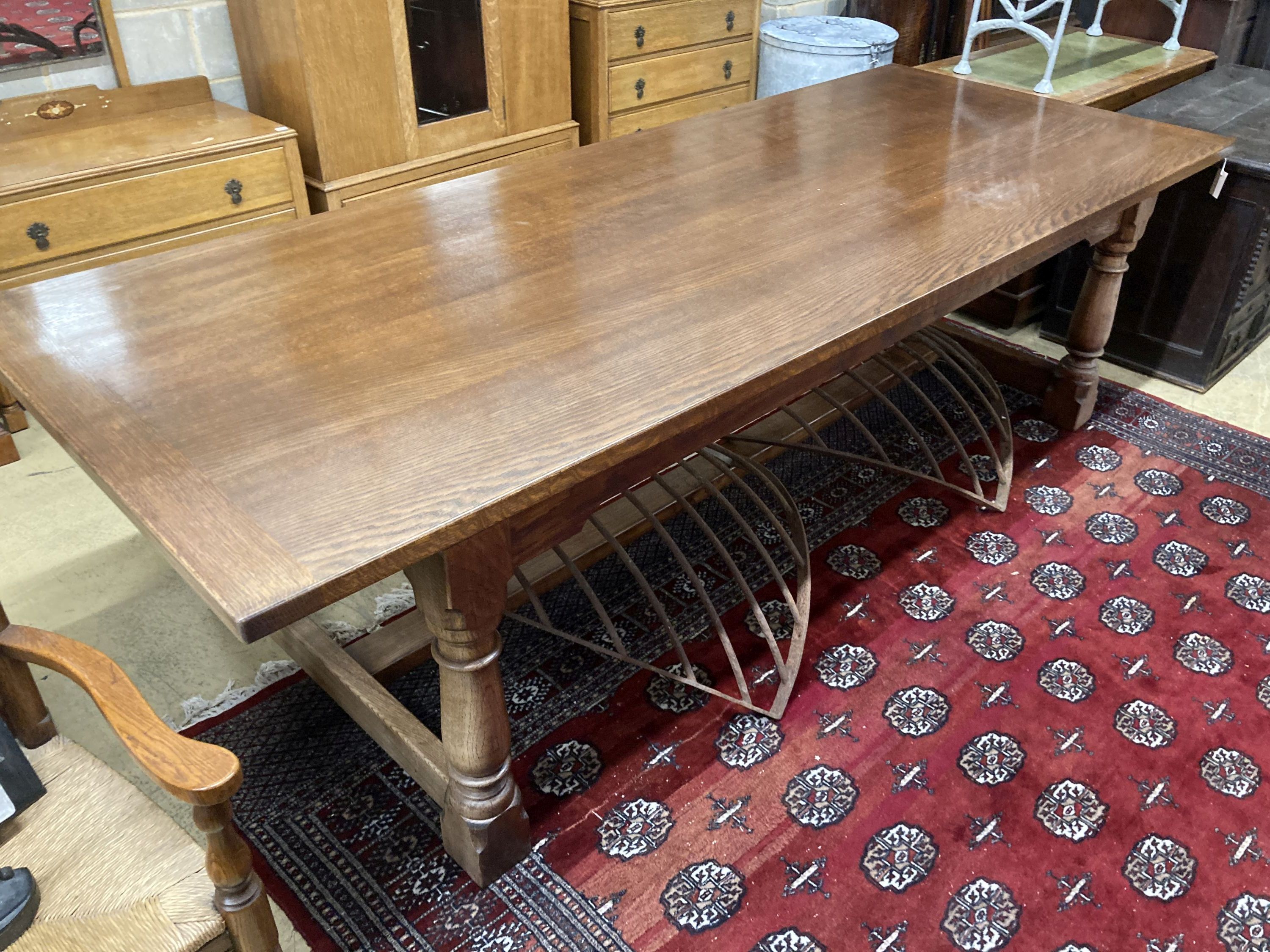 An 18th century style oak rectangular refectory dining table, length 277cm, width 109cm, height 76cm